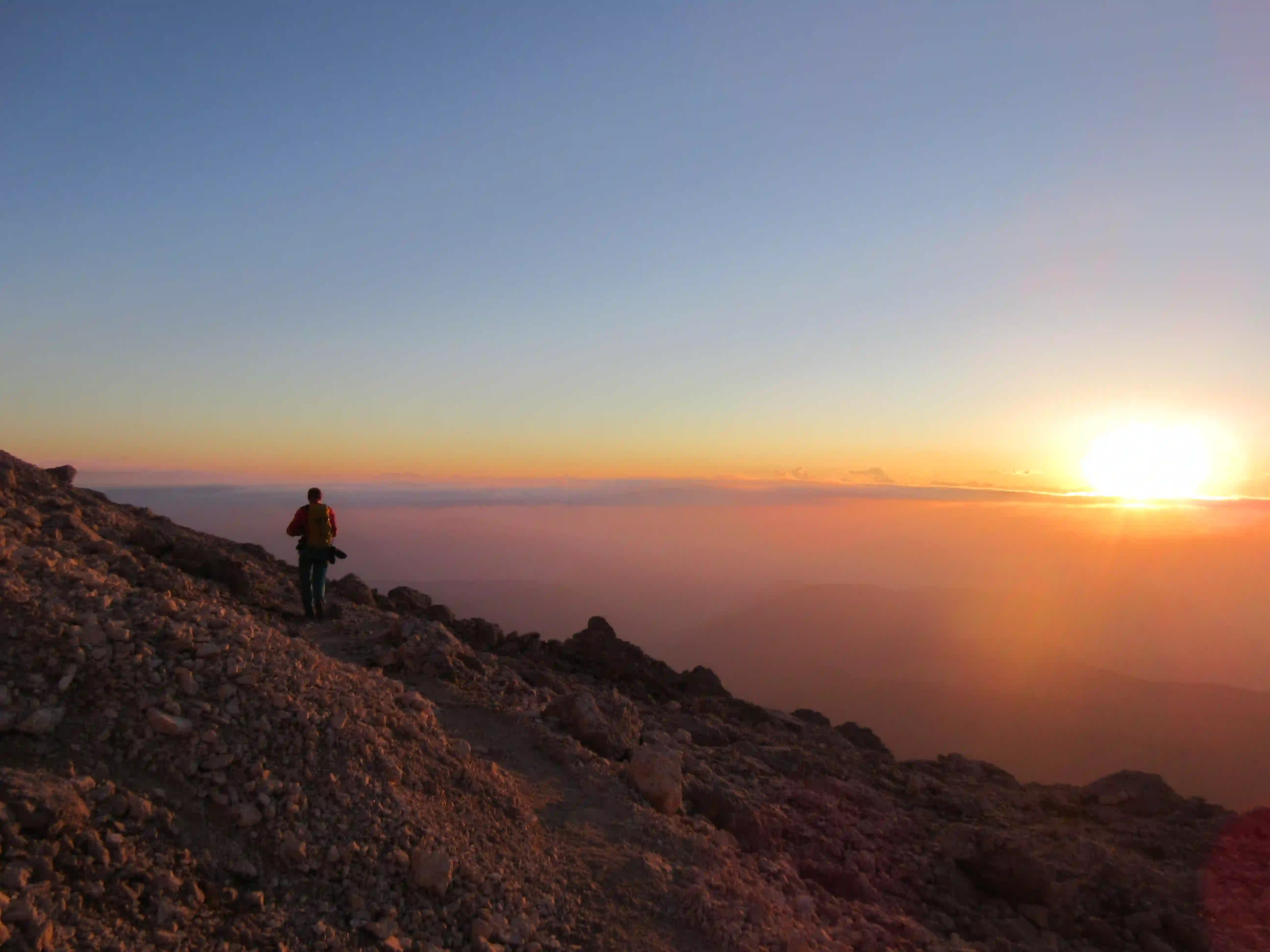 Sonne Dolomiten Klettern Sonnenuntergang vom Santnerpass Rosengarten mit Bergführer